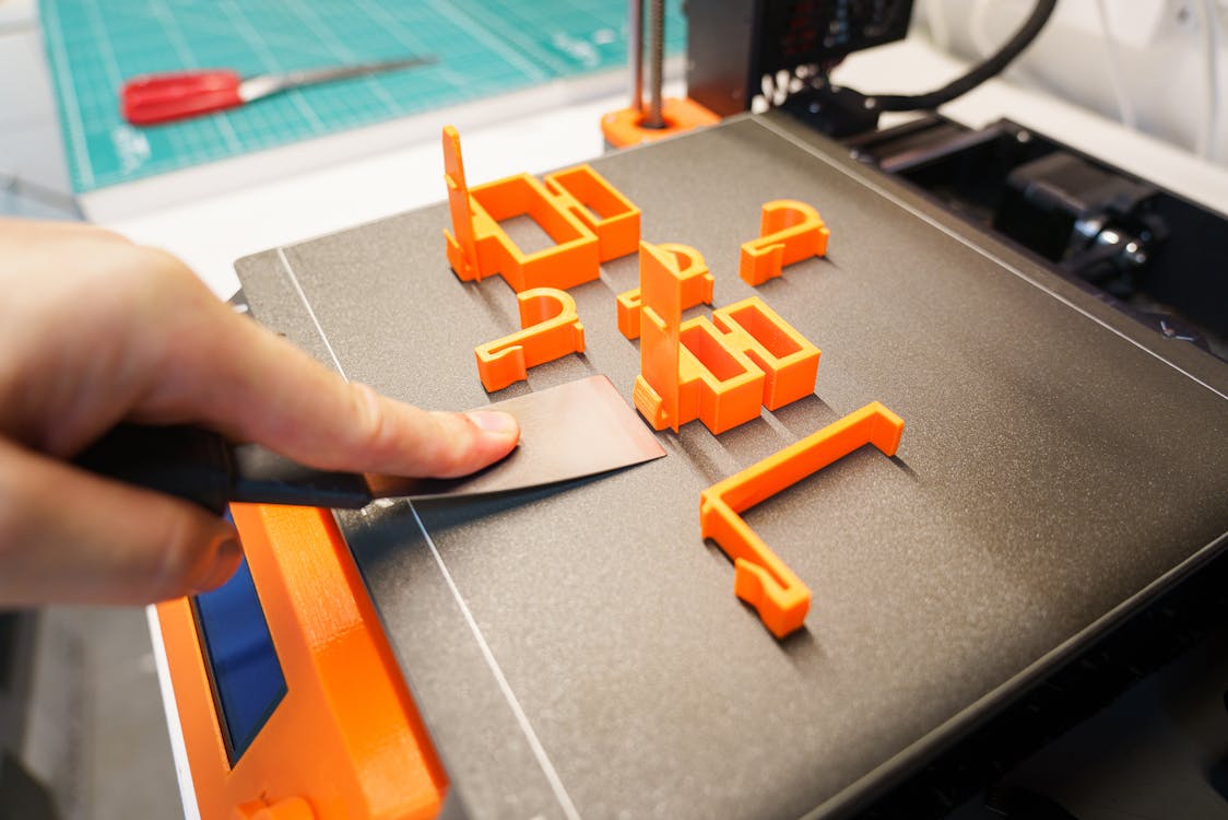 3D printed manufacturing parts showing complex internal geometries