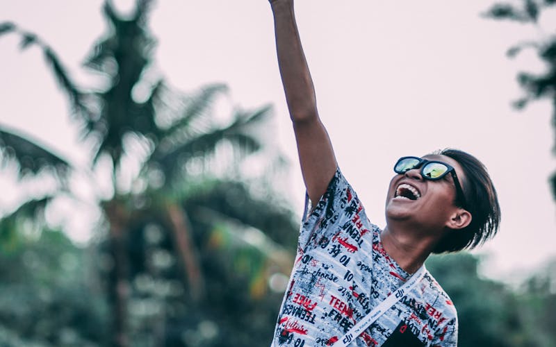 Drone pilot preparing a quadcopter for flight