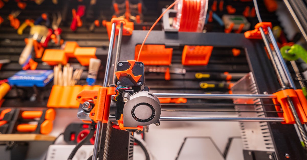 3D printed manufacturing fixture showing design iterations
